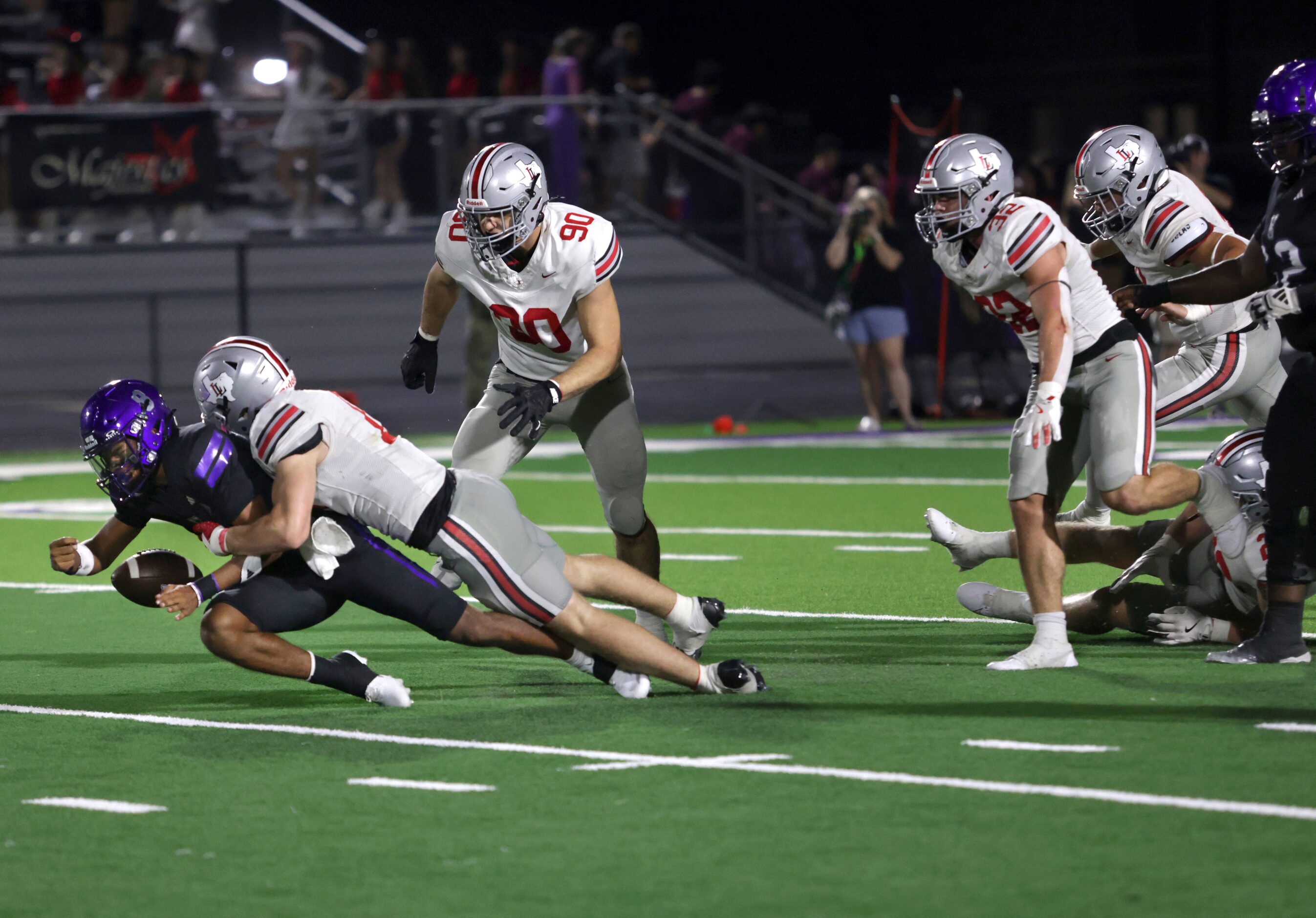 Anna player #8 Ziondre Williams gets a lucky break as referees rule him down before a...