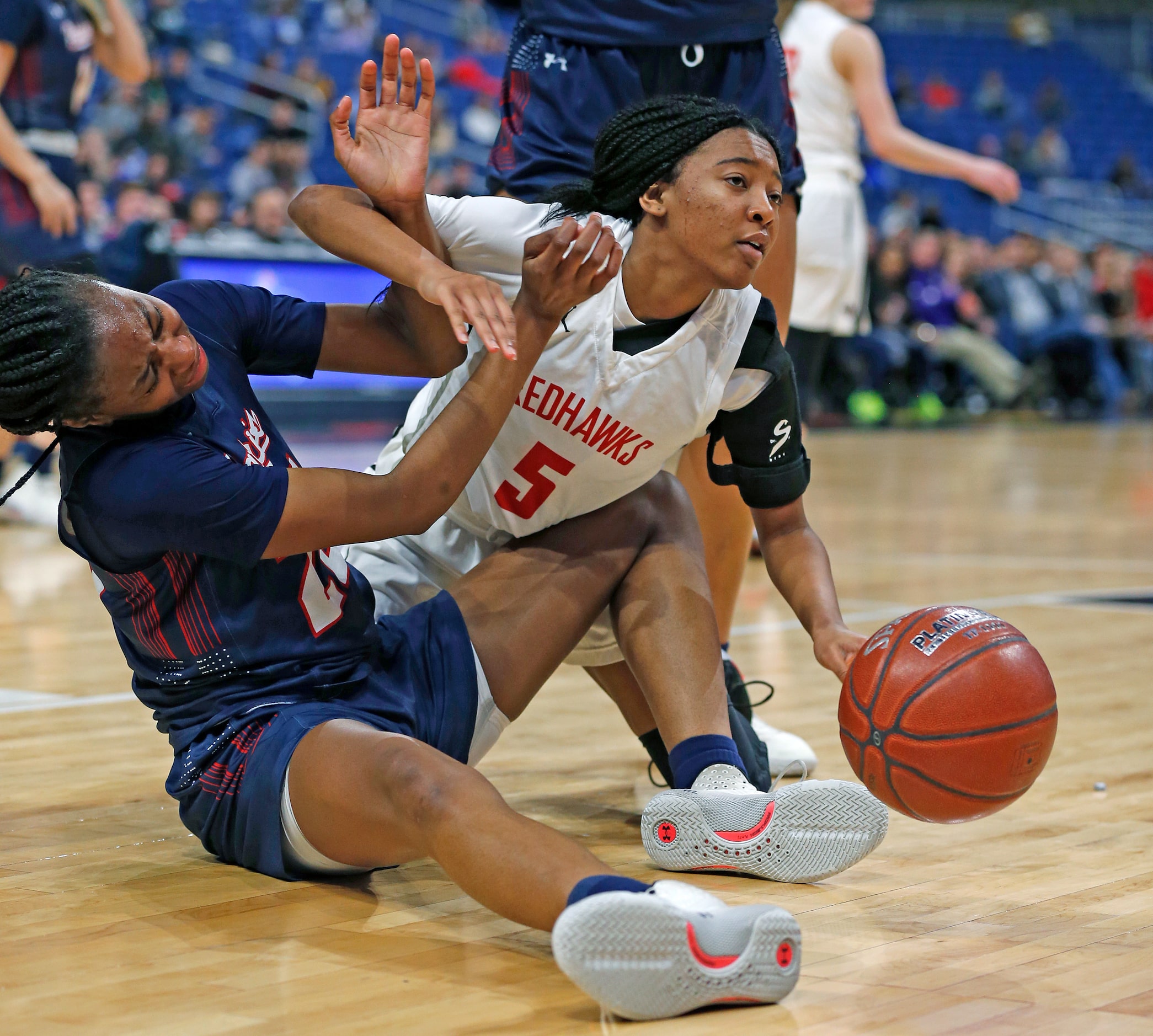 Frisco Liberty guard Zoe Junior #5 fight for a lose ball with Veterans Memorial forward...