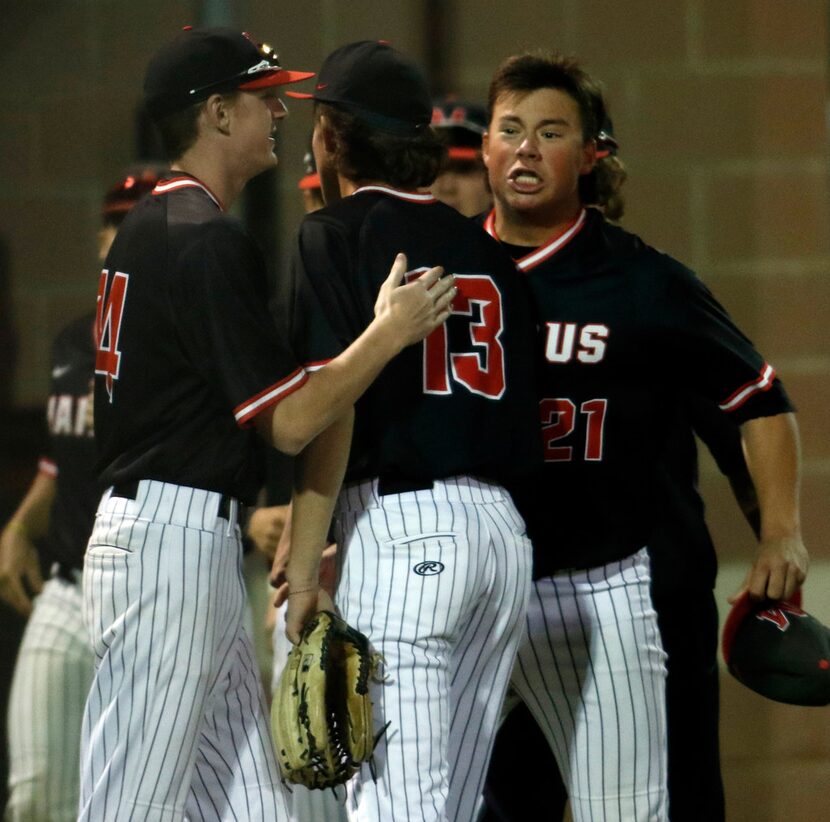 Flower Mound Marcus relief pitcher Reed Gallant (13) receives congratulations after...