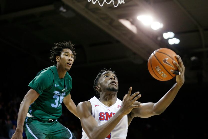 SMU Mustangs guard Shake Milton (1) attempts a shot after passing by Tulane Green Wave guard...