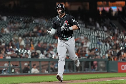 Arizona Diamondbacks' Randal Grichuk reacts after hitting a home run against the San...