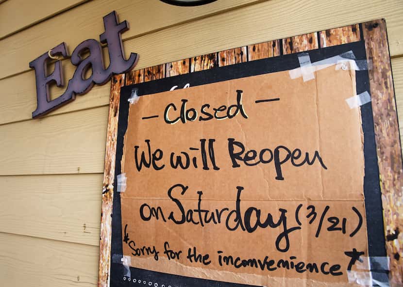 A closed sign next to the door at 5th Street Patio Cafe in Frisco, Texas, on Thursday, March...