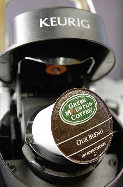 A Green Mountain Coffee single-serving brewing cup is seen in a Keurig machine.