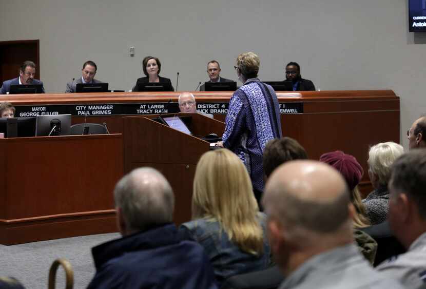 Antoinette Burks speaks during a council meeting at City Hall in McKinney as councilman...