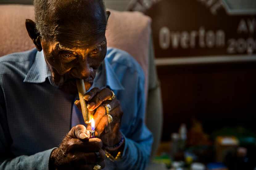 Richard Overton lights his first cigar of the day at 4:37 a.m. at his home in Austin. He...