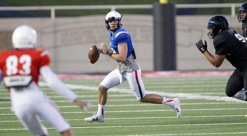 Redshirt freshman quarterback Colt Garrett looks for an open receiver as Texas Tech holds an...