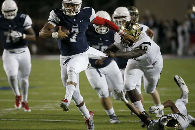 Plano East's Dieon Davis (48) pulls a jersey of Allen's Seth Green (7) during the first half...