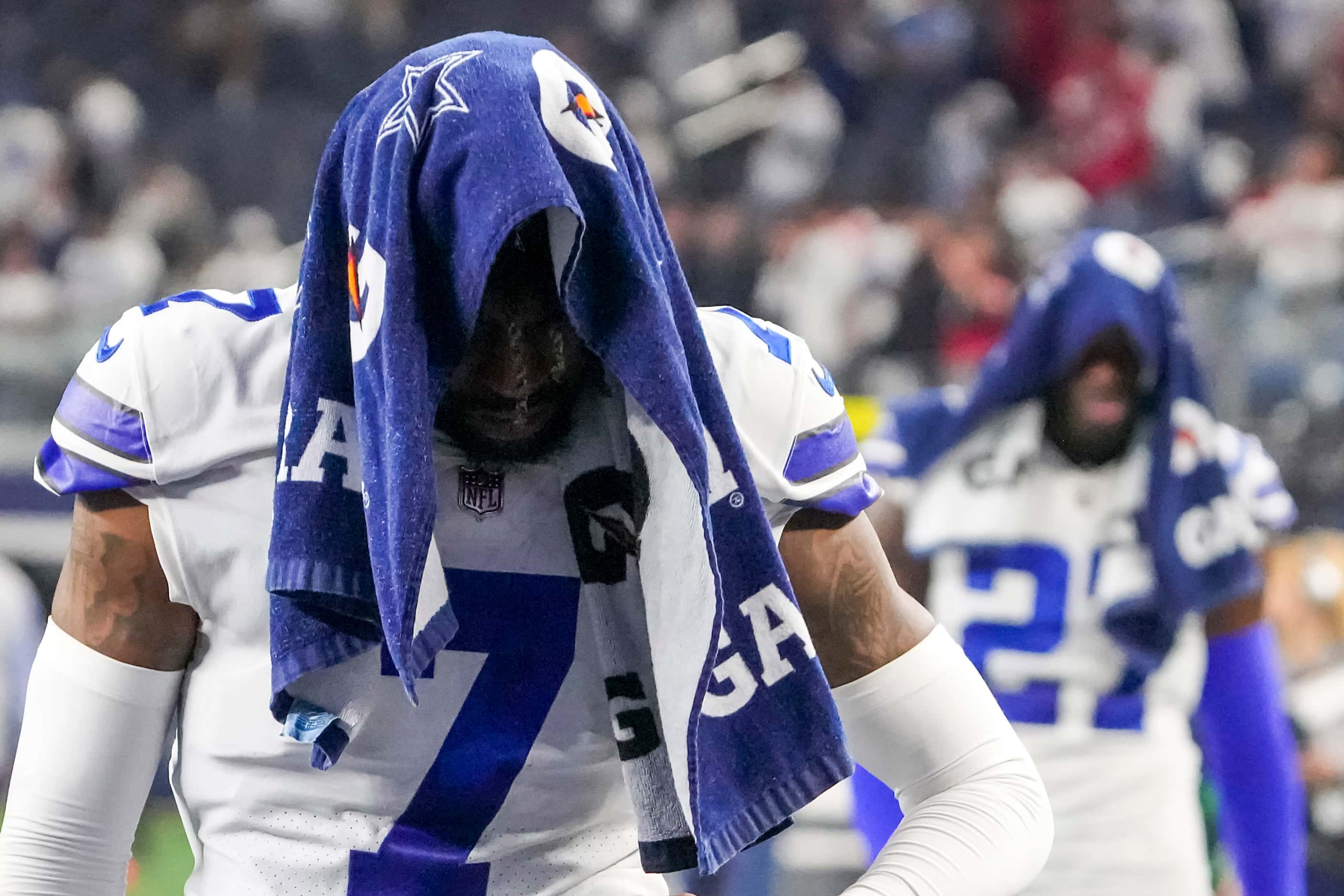 Dallas Cowboys cornerback Trevon Diggs (7) and safety Jayron Kearse (27) leave the field...