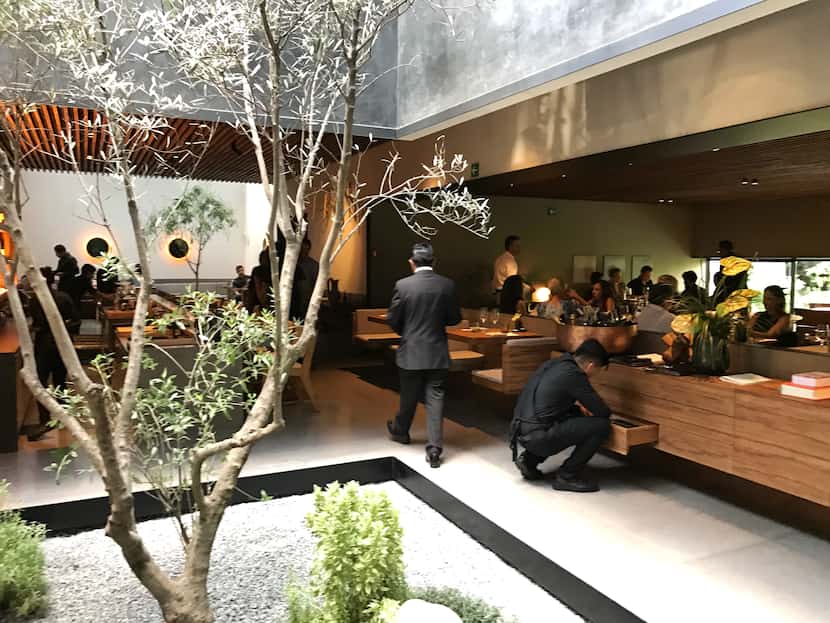 The new Pujol in Mexico City: The dining room is on the right, the omakase taco bar on the...