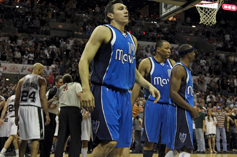 Dallas' Eduardo Najera leaves the floor after being ejected for a flagrant foul during the...
