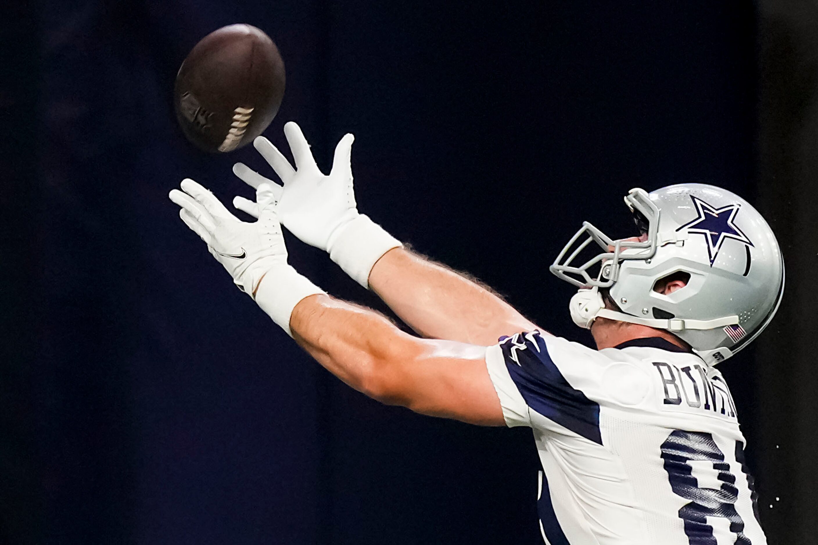 Dallas Cowboys tight end Ian Bunting catches a pass during the OTA team's practice at The...