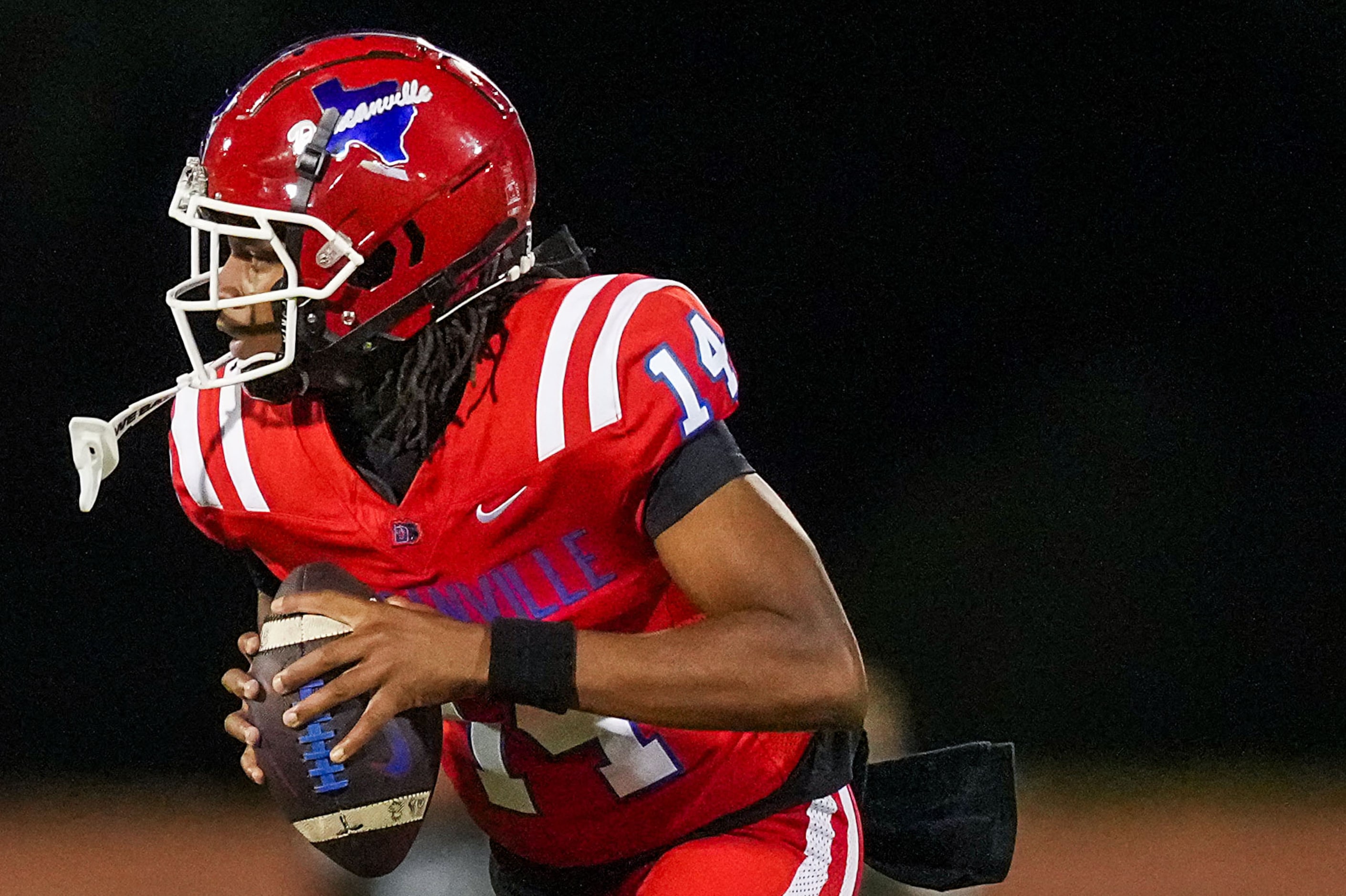 Duncanville quarterback J’Coryon Rivers looks to pass during the second half of a District...