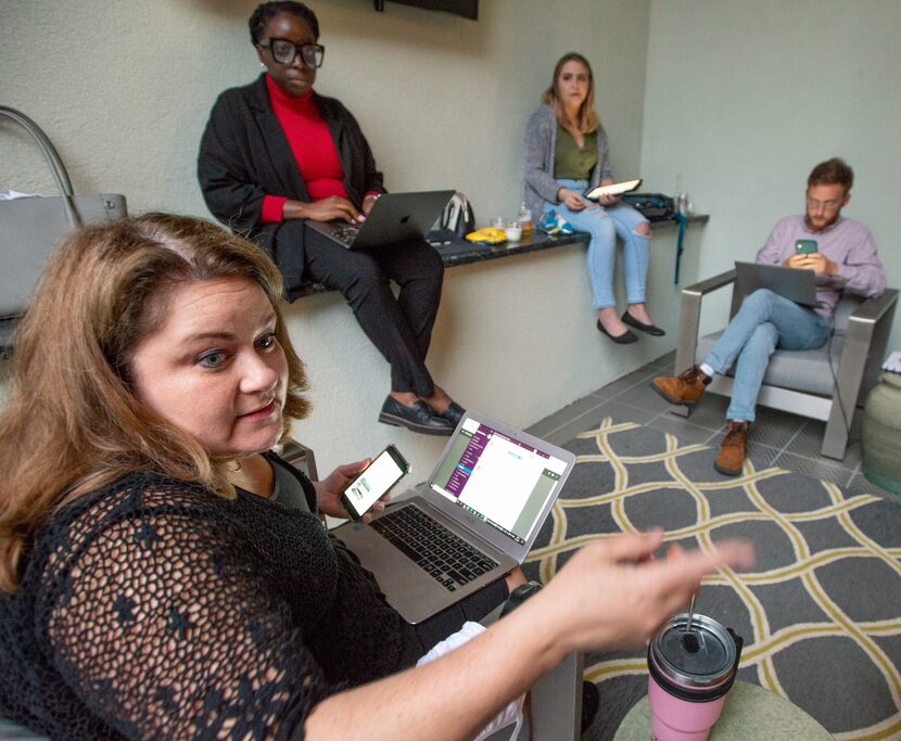 Democrat Jana Sanchez, left, talks with members of her staff, from left, campaign manager...