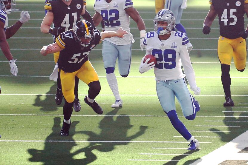 Dallas Cowboys cornerback C.J. Goodwin (29) runs up the field on a kickoff return in a game...