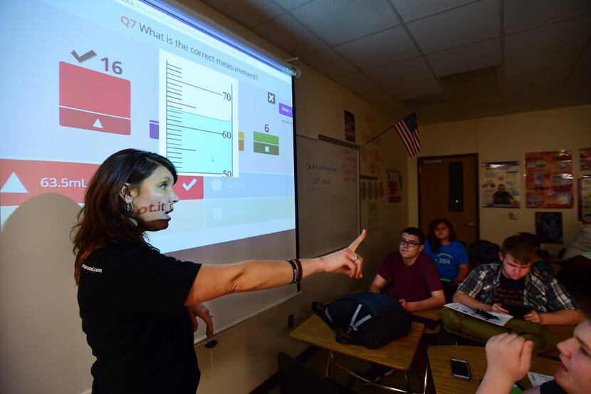 Guyer chemistry teacher Jeana Wesson works with her students using Google Classroom on Sept....