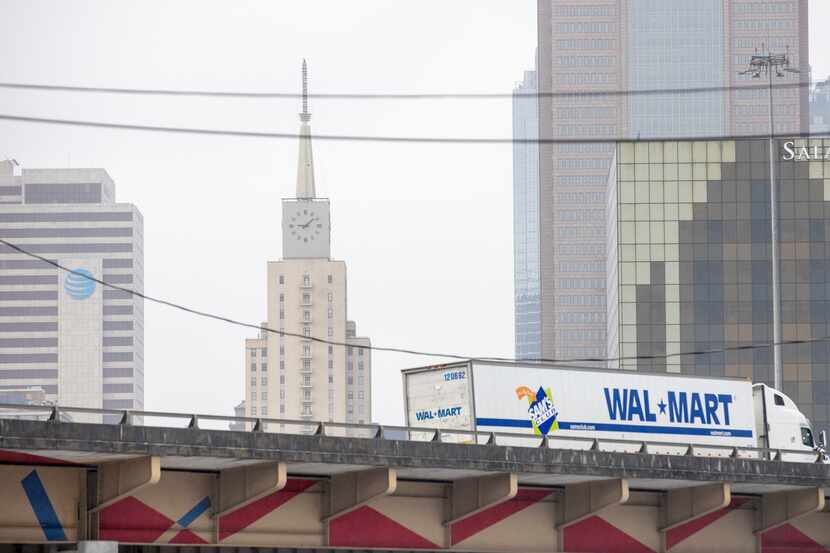 A Walmart semi-trailer truck drives northbound at North Central Expressway in downtown Dallas.