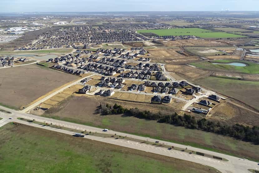 Homebuilders are working on the first phase of homes at M3 Ranch, a 750-acre community in...