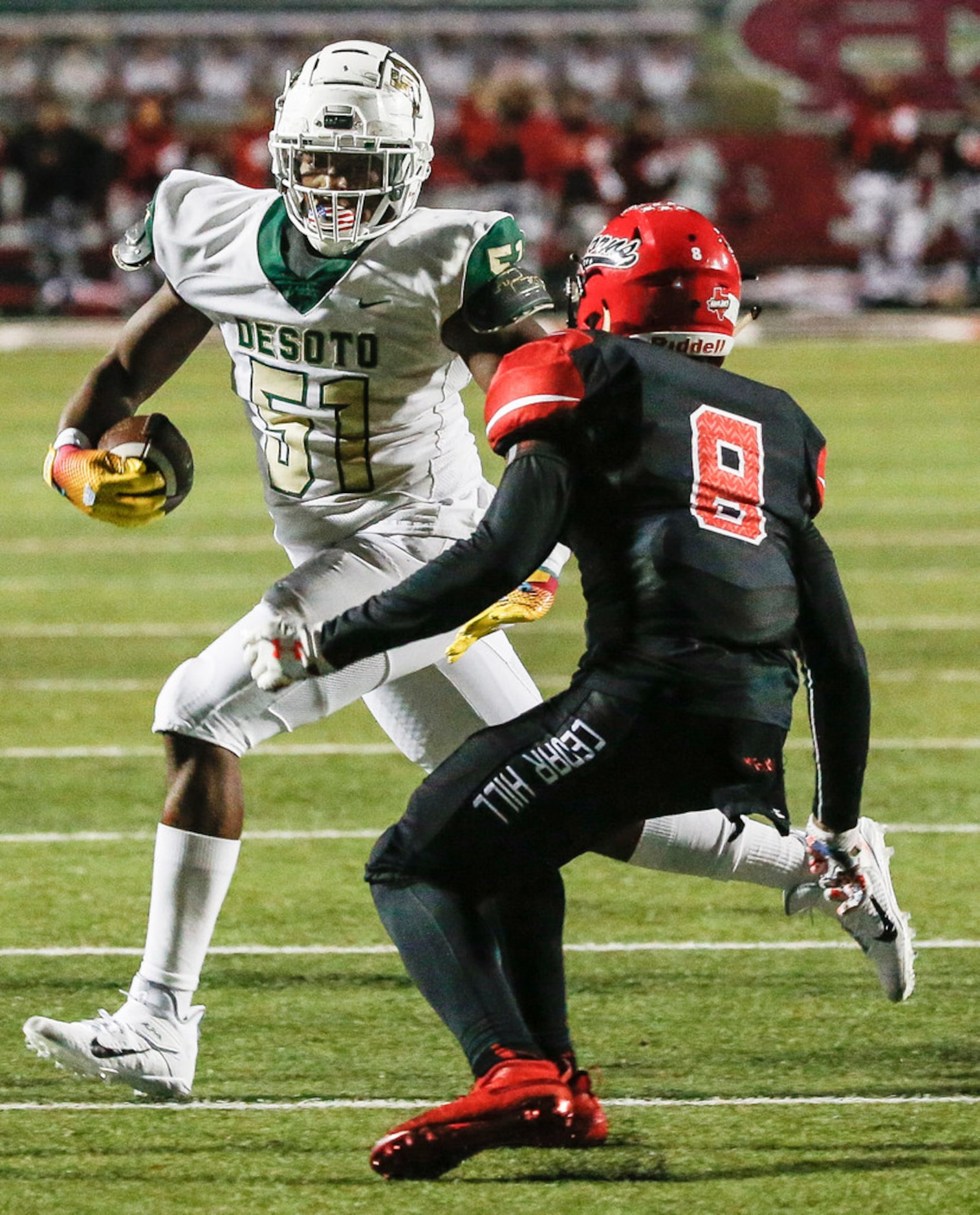 DeSoto offensive lineman Yakiri Walker (51) makes a break past Cedar Hill linebacker Stefan...