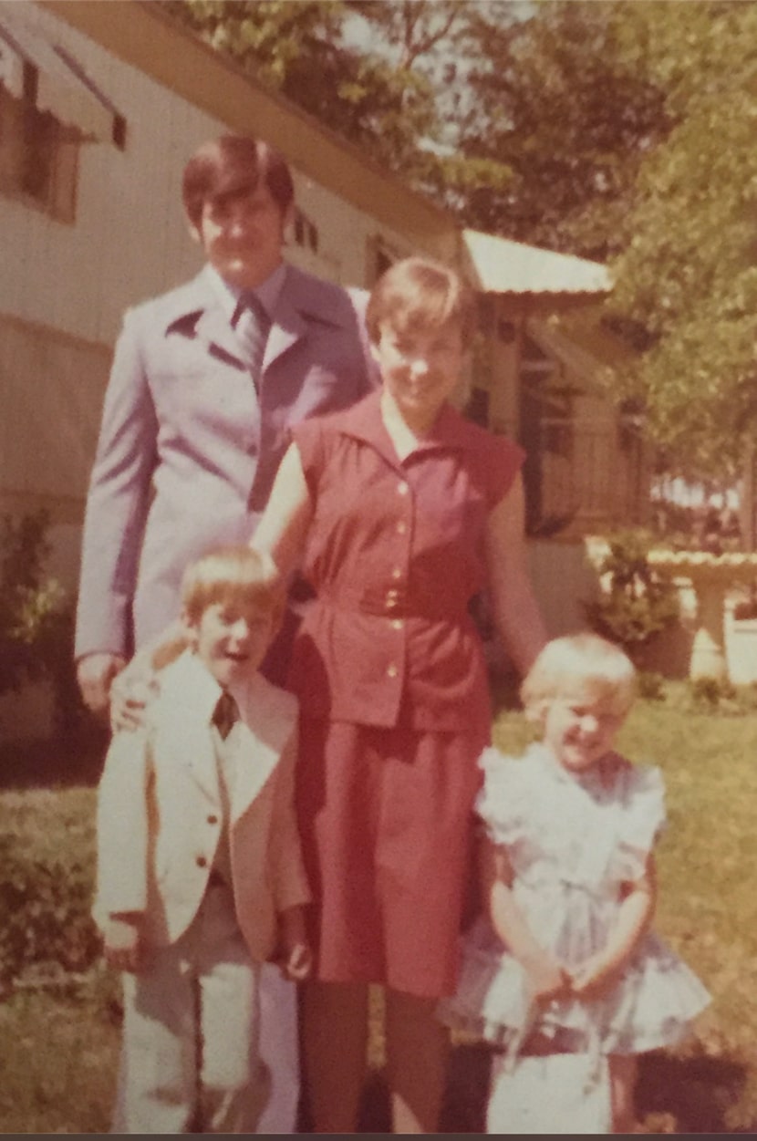 A family photo is of young Joey McGuire (bottom left), his father George (top left), his...