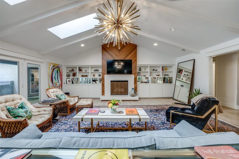 The herringbone wood accent around the fireplace was added during the recent renovations.