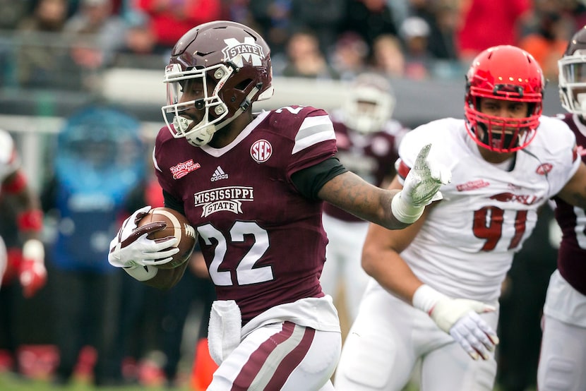 Mississippi State running back Aeris Williams (22) crosses the goal line for a touchdown...