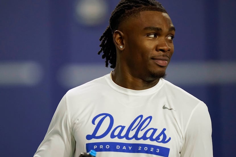 SMU wide receiver Rashee Rice stands on the field during an NFL Pro Day in Dallas,...