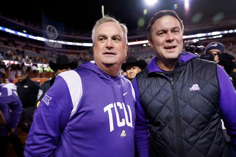 TCU Horned Frogs head coach Sonny Dykes (left)  and athletic director Jeremiah Donati...