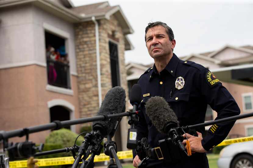 Deputy Chief Reuben Ramirez speaks to the media at the scene of a triple homicide in Dallas...