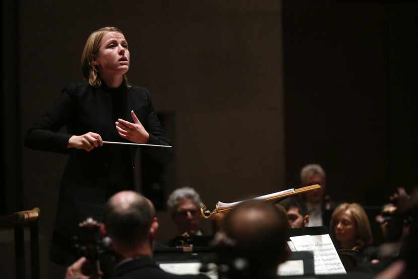 Assistant conductor Ruth Reinhardt leads the Dallas Symphony Orchestra on Thursday. 