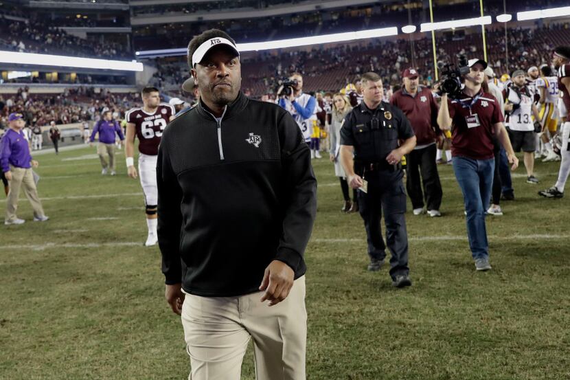 This Nov. 24, 2016 photo shows Texas A&M coach Kevin Sumlin leaving Kyle Field after losing...