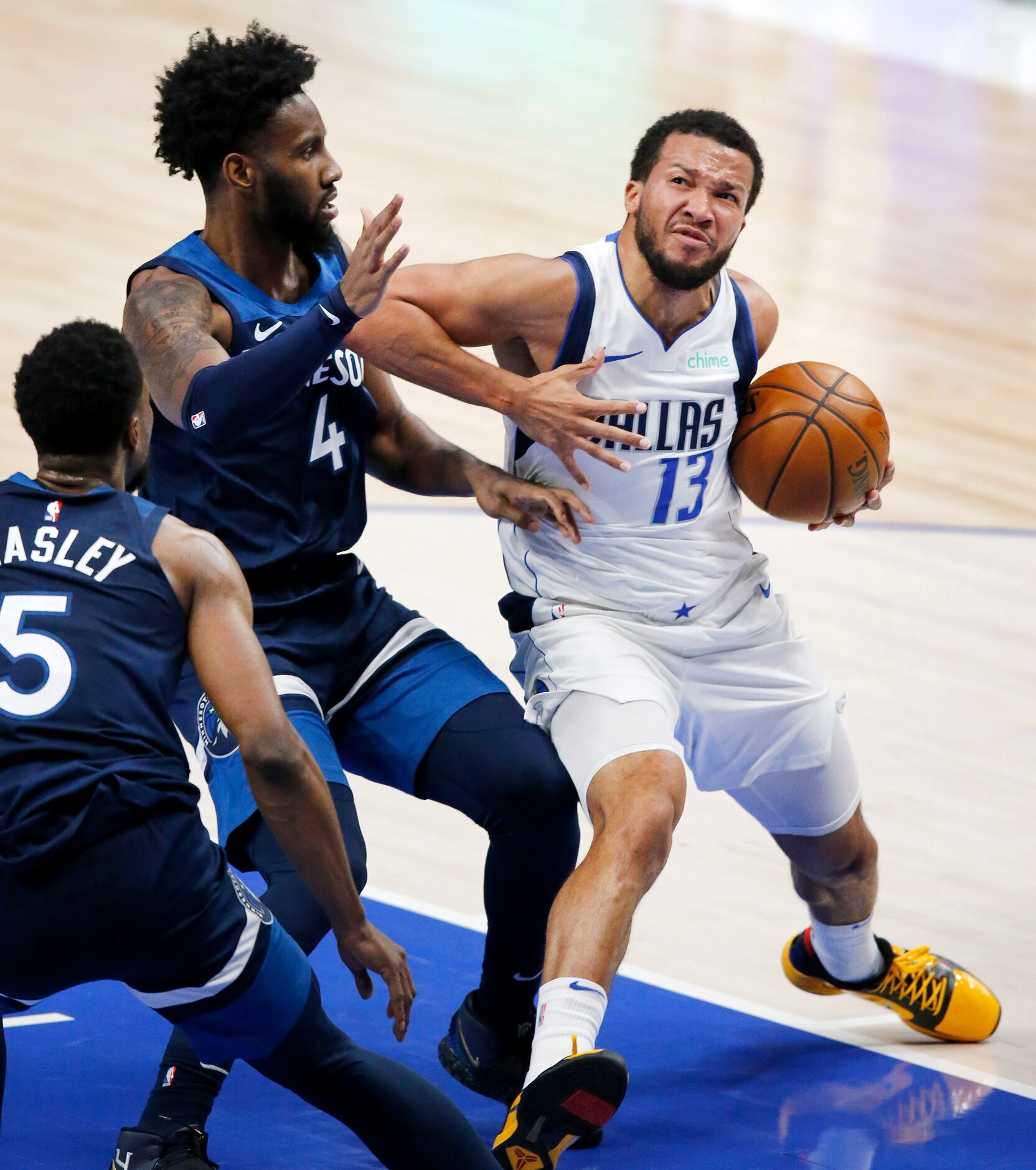 Dallas Mavericks guard Jalen Brunson (13) drives the lane against Minnesota Timberwolves...