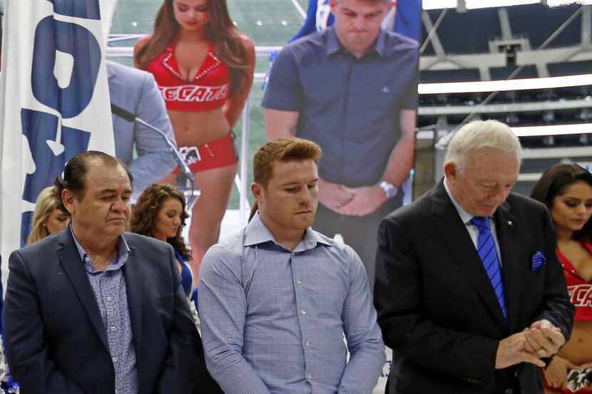 Trainer Jose Ã’ChepoÃ Reynoso (left), Canelo Alvarez (center) and Dallas Cowboys owner...