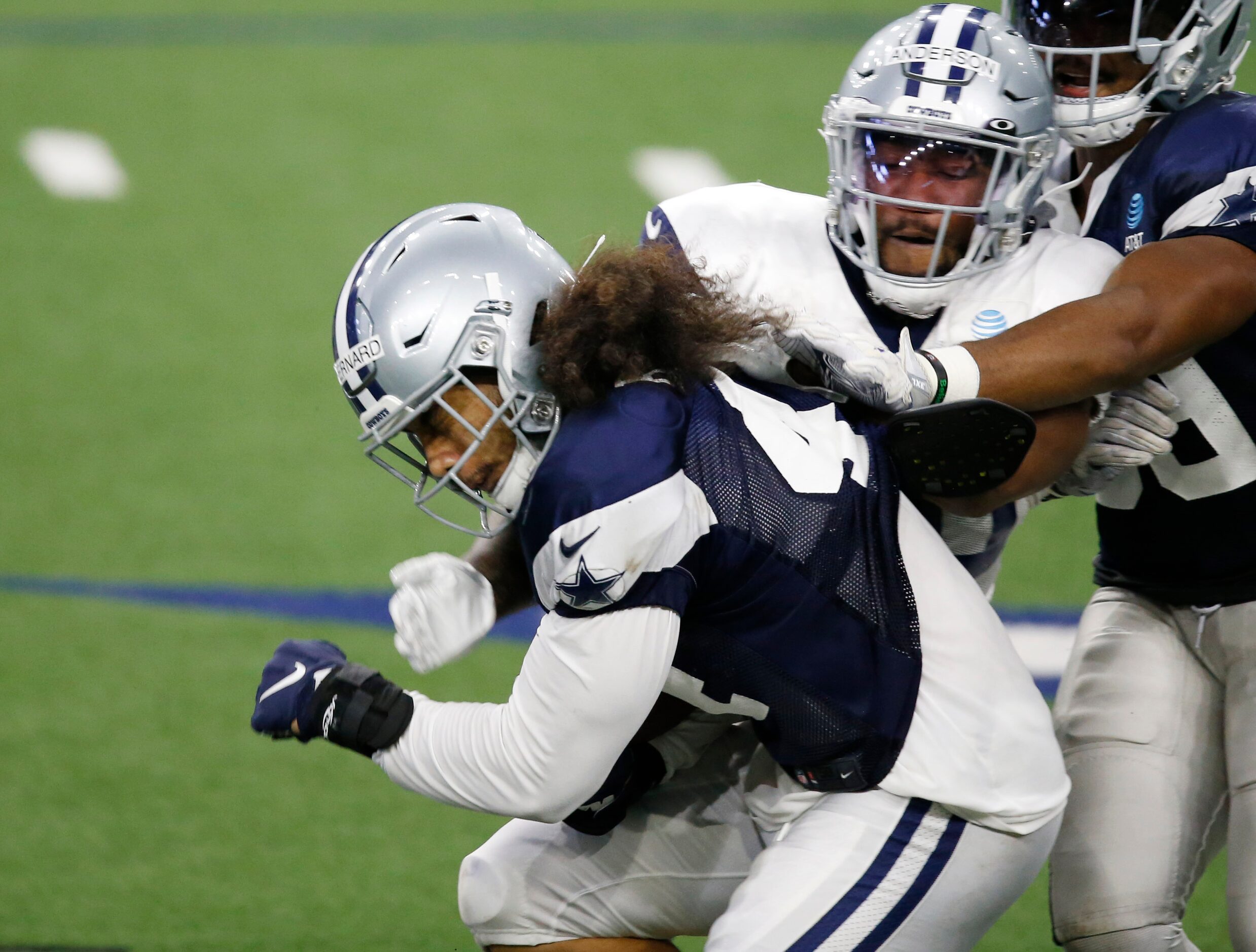 Dallas Cowboys linebacker Francis Bernard (44) is tackled by Dallas Cowboys running back...