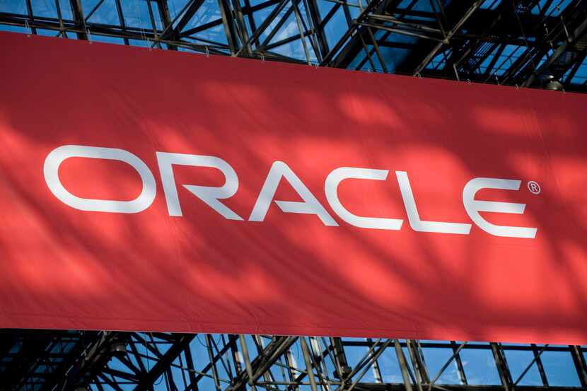 ORG XMIT: NYBZ118 FILE - In this Jan. 14, 2009 file photo, a sign for Oracle software hangs...