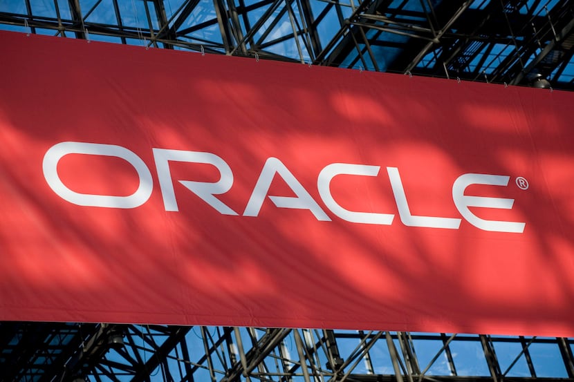 In this Jan. 14, 2009 file photo, a sign for Oracle software hangs at the annual National...
