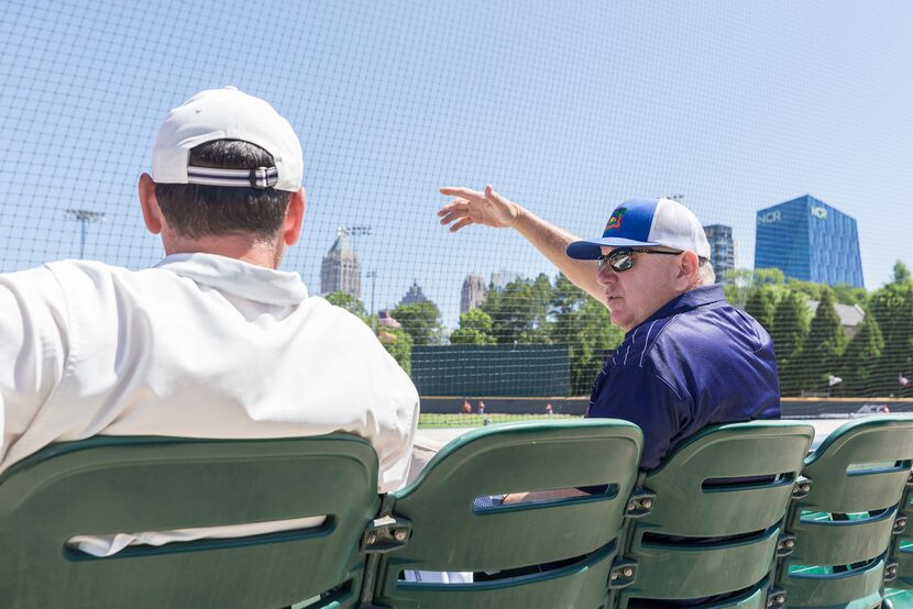 FILE - Texas Rangers area scout, Derrick Tucker, left, and  Senior Director of Amateur...