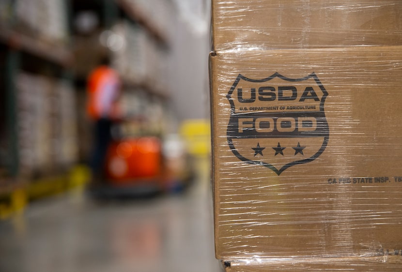 A pallet of English walnuts supplied by the USDA at the North Texas Food Bank on Feb. 6,...