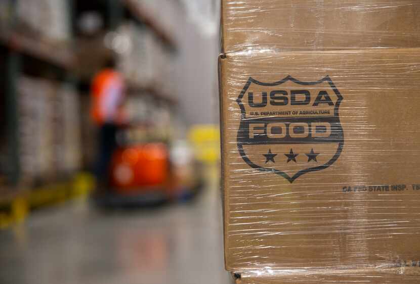 A pallet of English walnuts supplied by the USDA at the North Texas Food Bank on Feb. 6,...