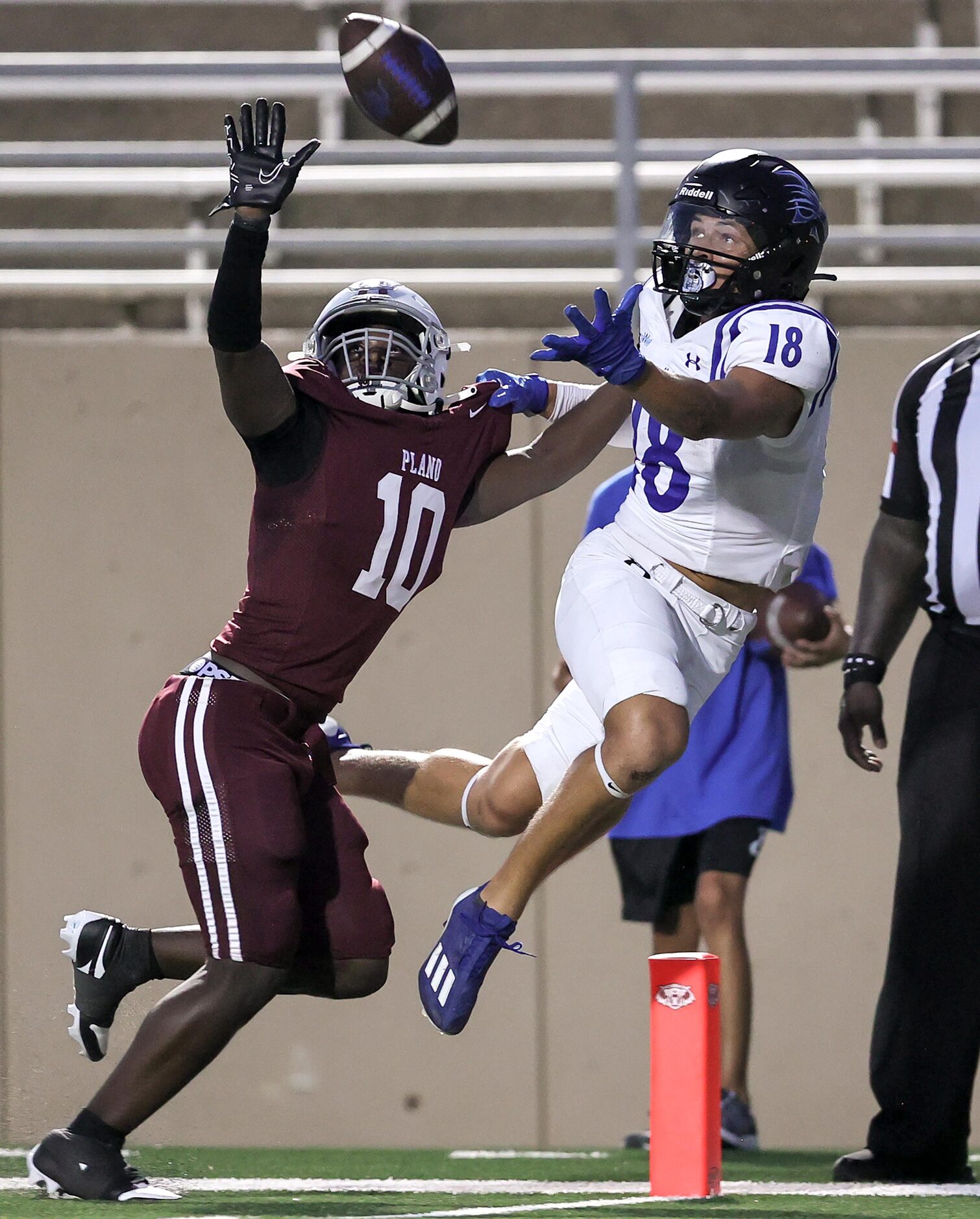 Byron Nelson wide receiver Ezra Malamura (18) tries to come up with a reception as he is...