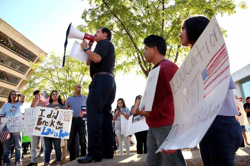 Dallas attorney Domingo Garcia speaks during a support rally for DACA recipients at City...