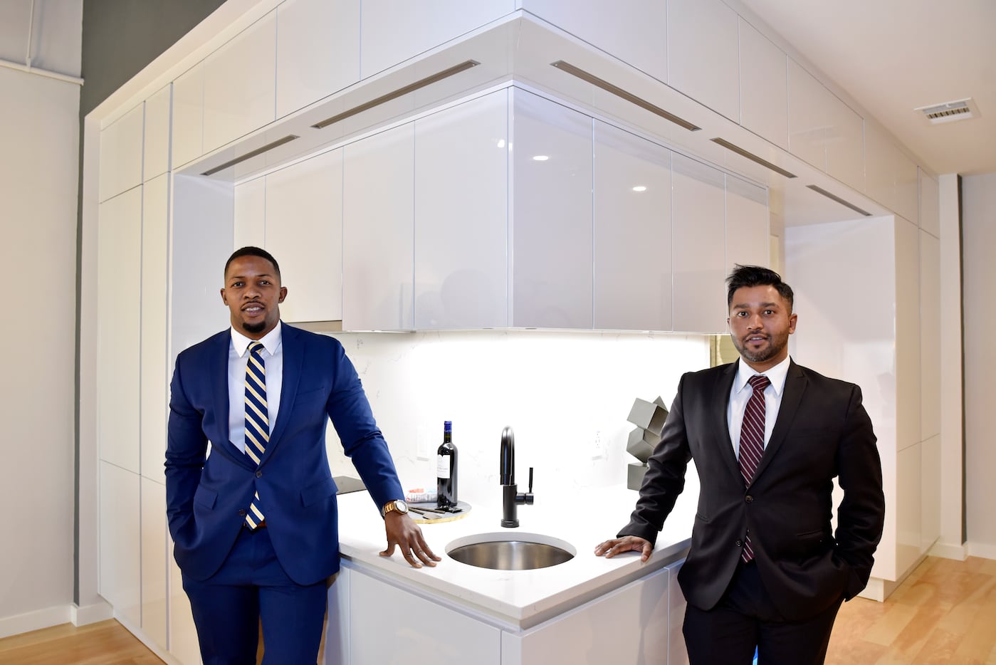 Developers Ike Bams (left) and John Williams of Bluelofts shown with an assembled kitchen...