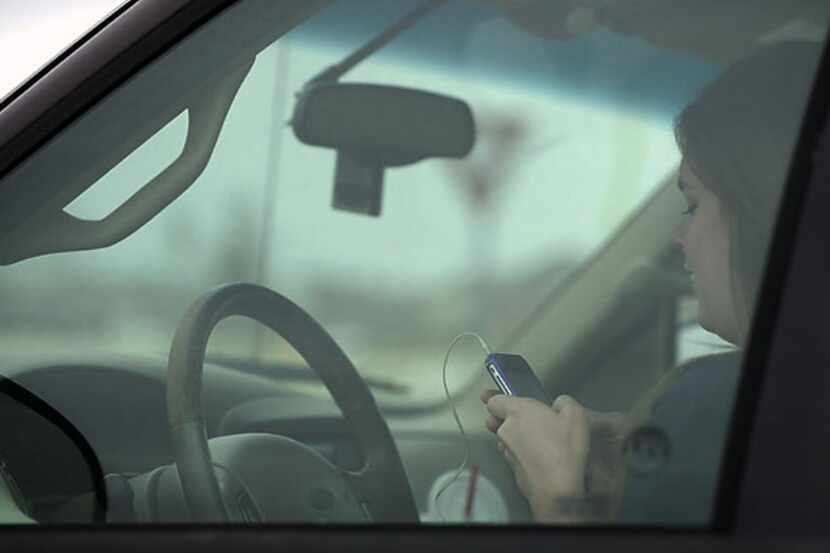A Denton city ordinance banning texting and other activities using cellphones while driving...