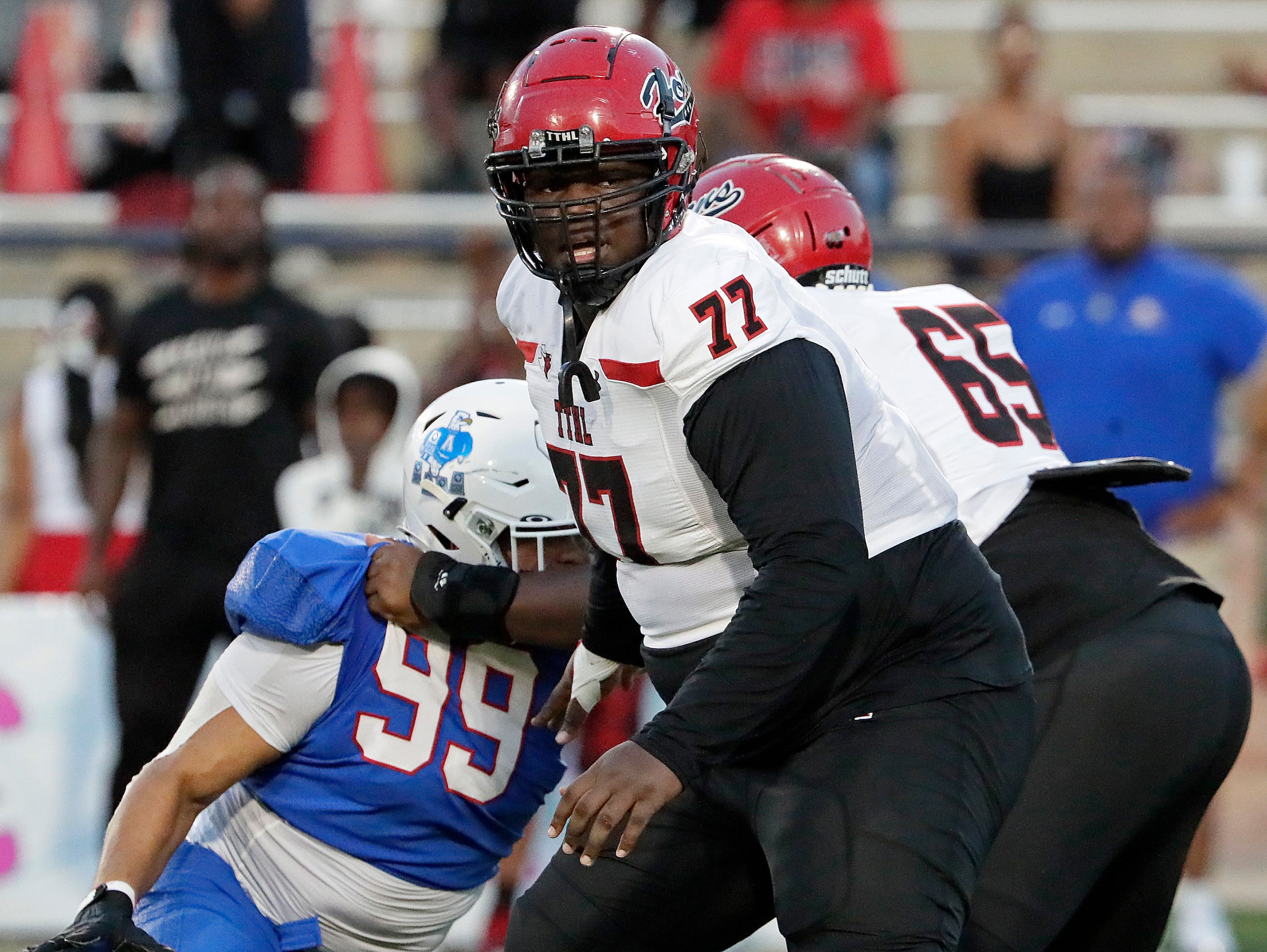 Cedar Hill High School offensive lineman Jordan Coleman (77) during the first half as Allen...