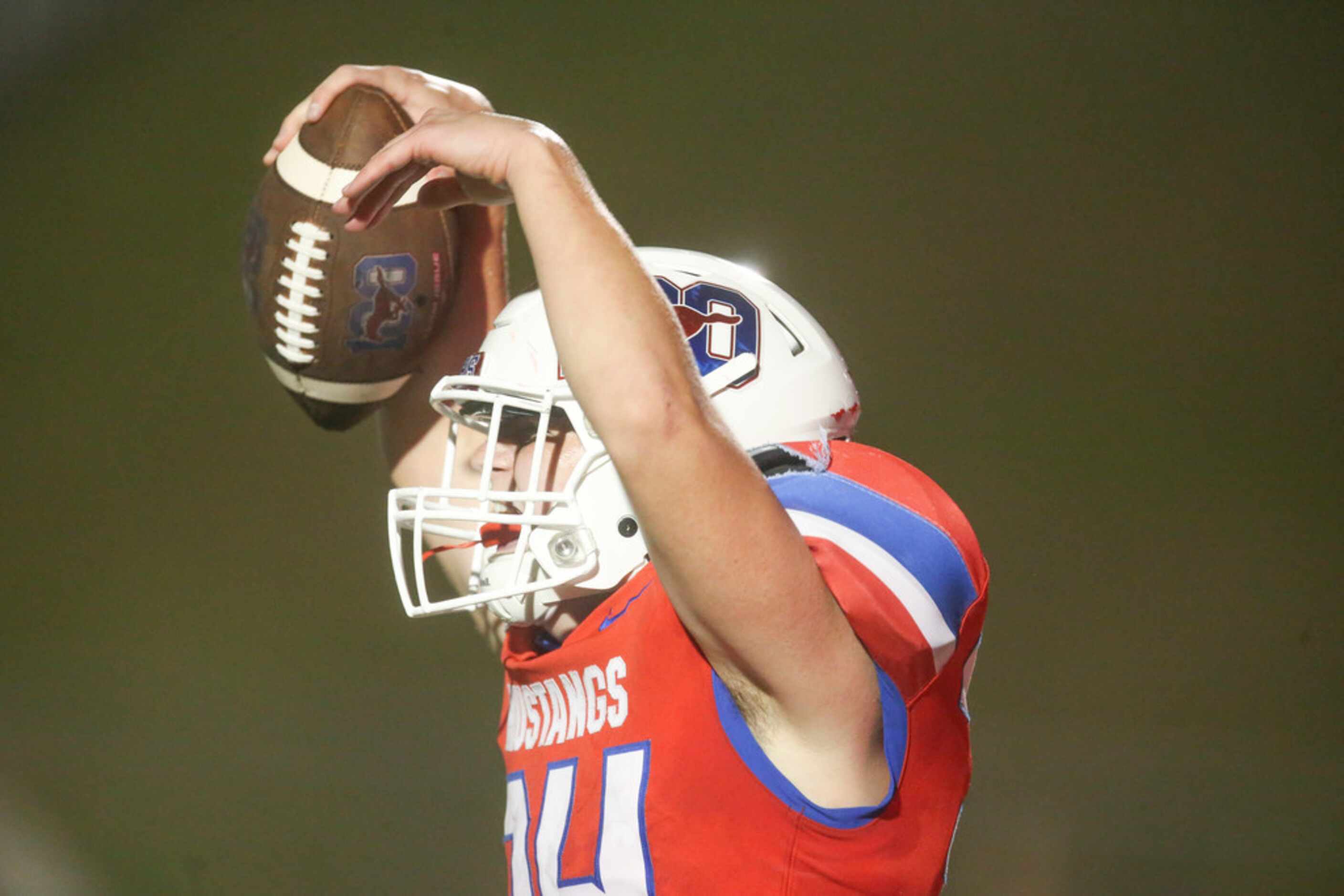 Grapevine running back Eliot Hanson (34) celebrates his touchdown during the second half of...