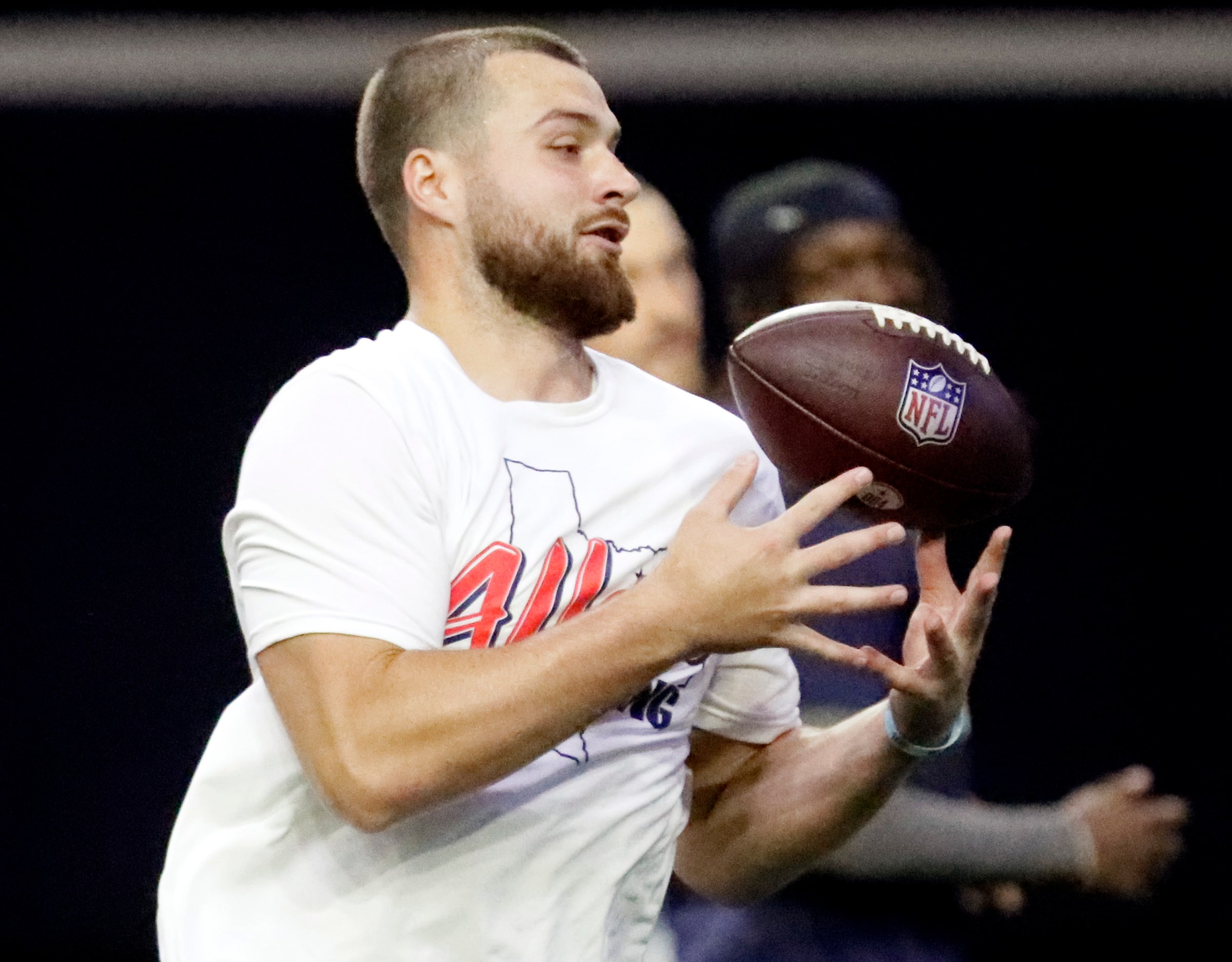 Tight end Jake Feruson makes a catch as the Dallas Cowboys held mini camp at the Ford Center...