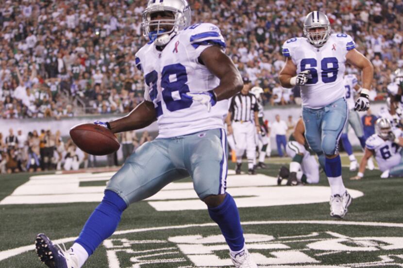 Dallas Cowboys running back Felix Jones (28) scores a 1-yard touchdown in the fourth quarter...