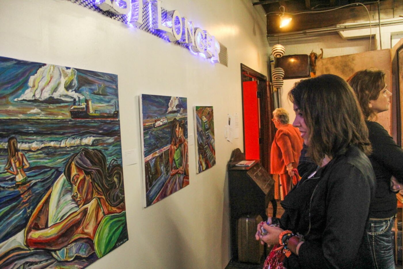 Karla Ceballos views work at the Continental Gin Building in Deep Ellum Open Studios on...