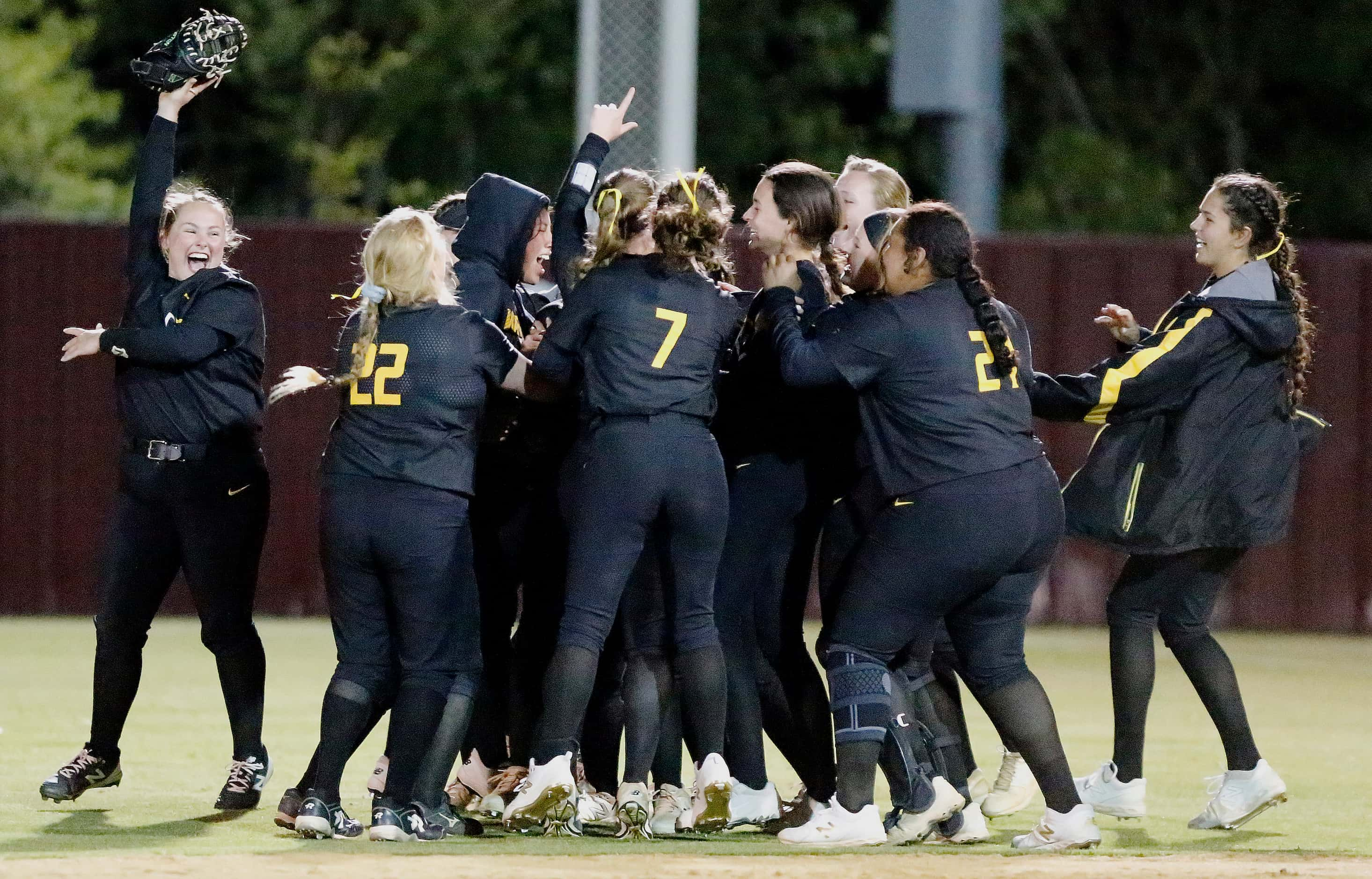 Memorial mobs right fieldr Gabby King (1) after she made a running catch to end the game and...