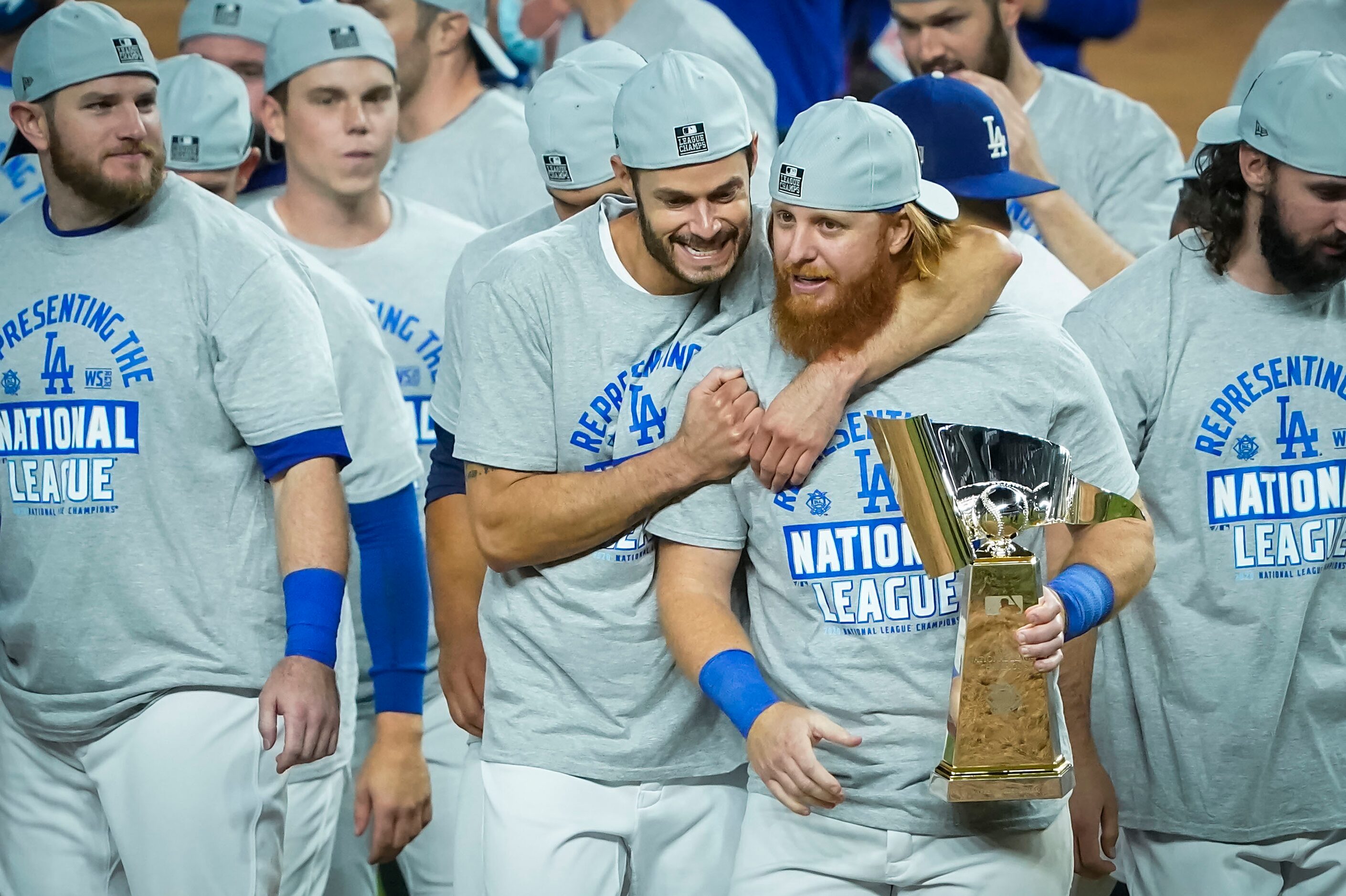 Los Angeles Dodgers third baseman Justin Turner celebrates with the championship trophy...