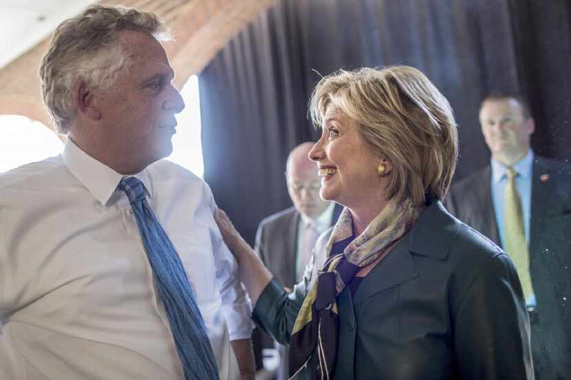 Virginia Gov. Terry McAuliffe and Democratic presidential nominee Hillary Clinton were in...